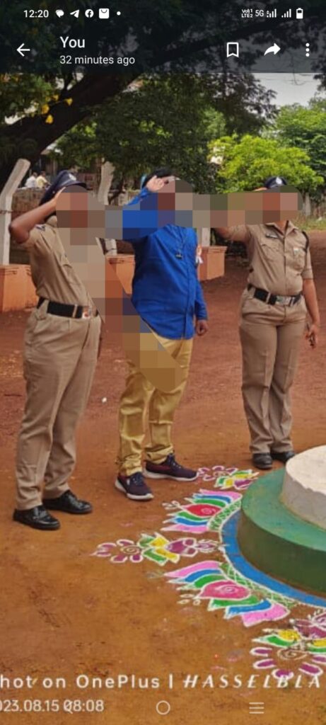 మహిళా పోలీసుల మధ్య ఉన్న అజ్ఞాతవాసి ఎవరు… ?